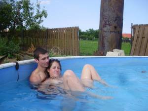 A young couple playng in the pool [x37]-f6x2hs9qhp.jpg