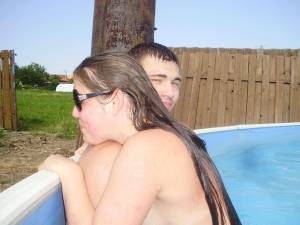 A young couple playng in the pool [x37]-l6x2hstq6z.jpg