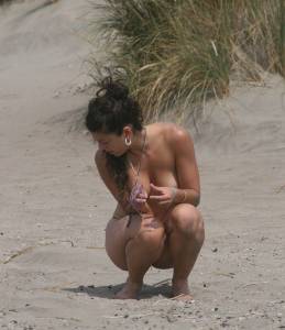 Topless girl goes full-nudist at textile beach  Almeria (Spain) q6x555q2lw