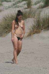 Topless girl goes full-nudist at textile beach  Almeria (Spain) f6x555kzcq