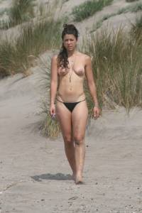 Topless girl goes full-nudist at textile beach  Almeria (Spain)-16x555meqc.jpg
