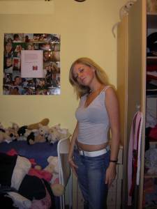 Pretty blonde teen with very firm tits nude in her bedroomf7affu8v5q.jpg