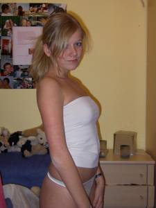 Pretty blonde teen with very firm tits nude in her bedroom27affuhnde.jpg