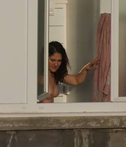 Voyeur-_-neighbour-topless-at-the-window-d7bn1a4mjg.jpg