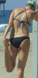 Athletic-bikini-MILF-bending-over-to-stretch-u7bx6w7sr2.jpg